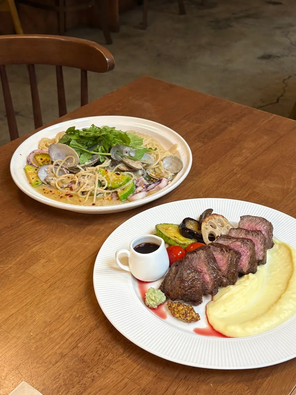 House steak and white pollock roe pasta served together