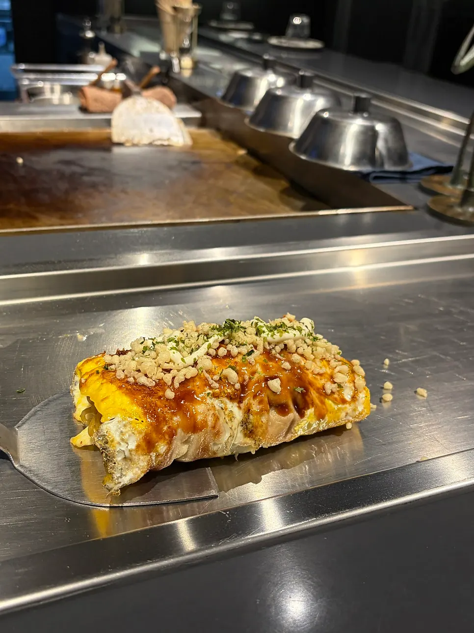 Potato salad topped with crumble and baked beans