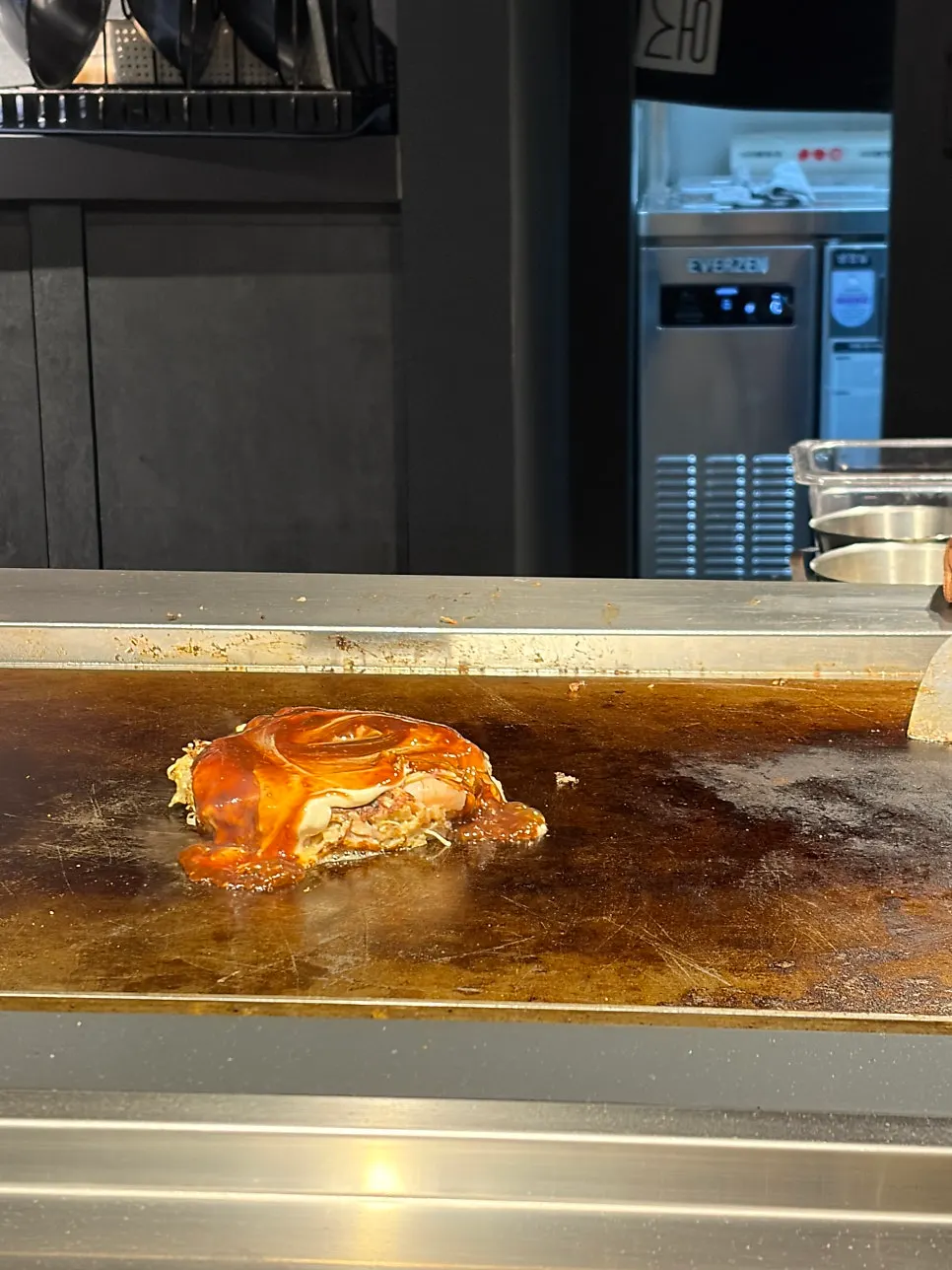 Yakisoba wrapped with egg omelet and pork belly