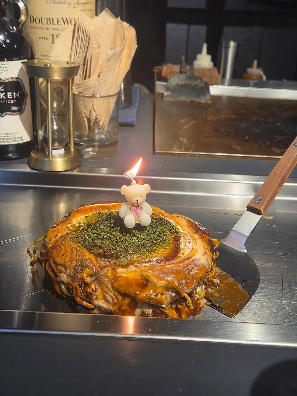 A slice of Oshi Modan-yaki served on a plate