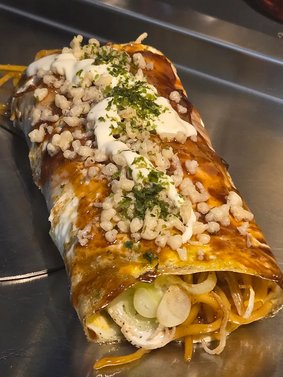 Yakisoba noodles inside the pork belly roll