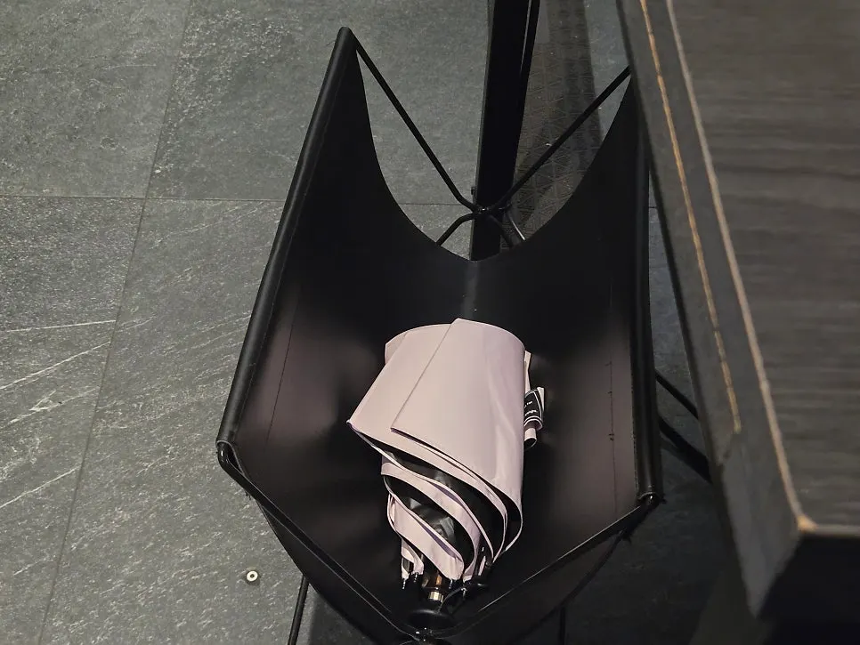 Storage space set up next to the seats for bags