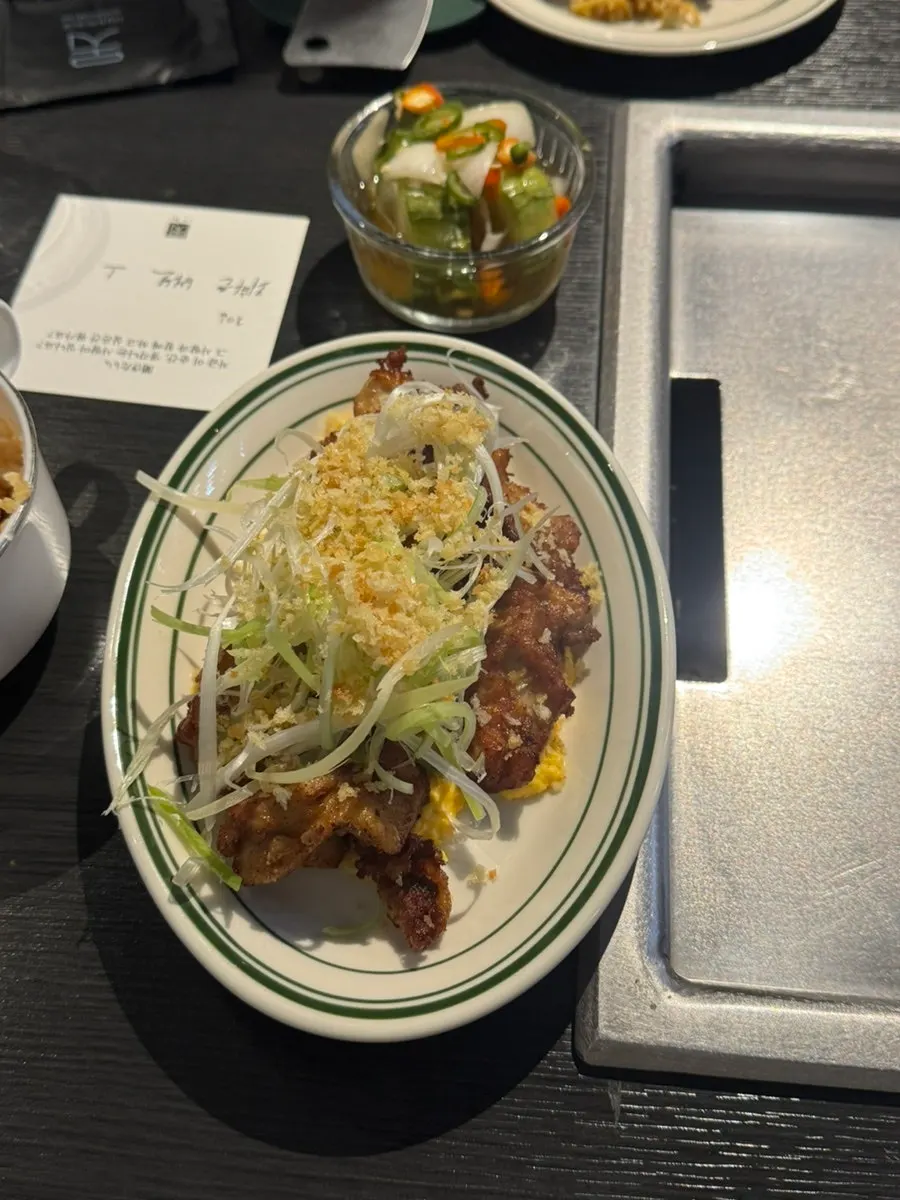 Serving a portion of the yakisoba pork belly rolls