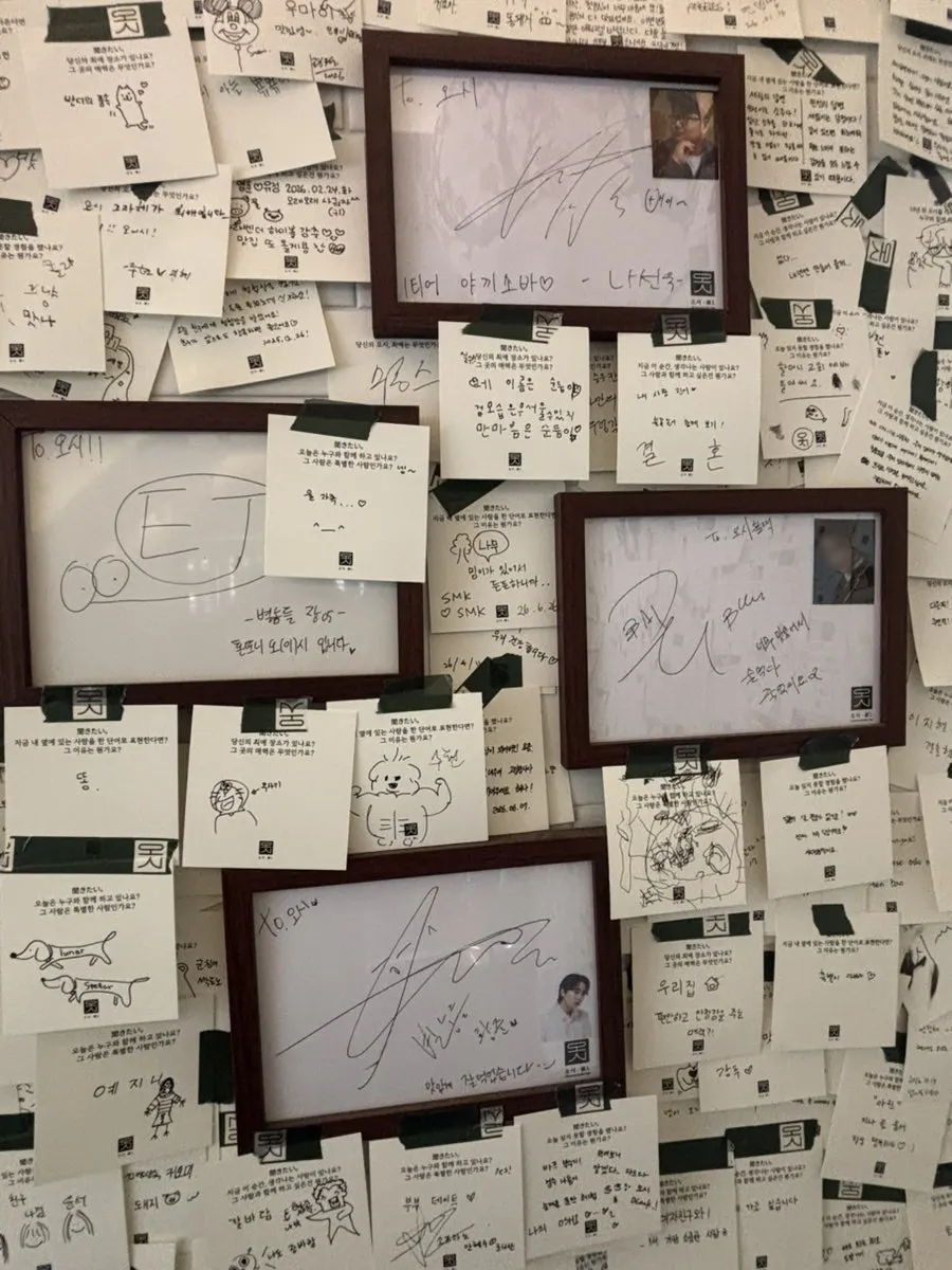Entrance wall covered in visitor message cards