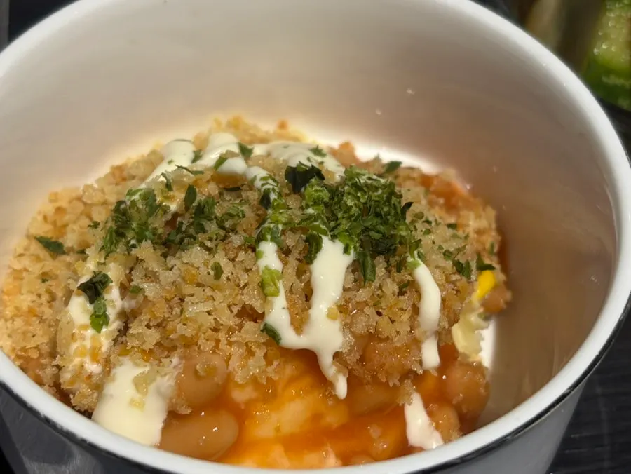 Potesara beans potato salad topped with mayonnaise