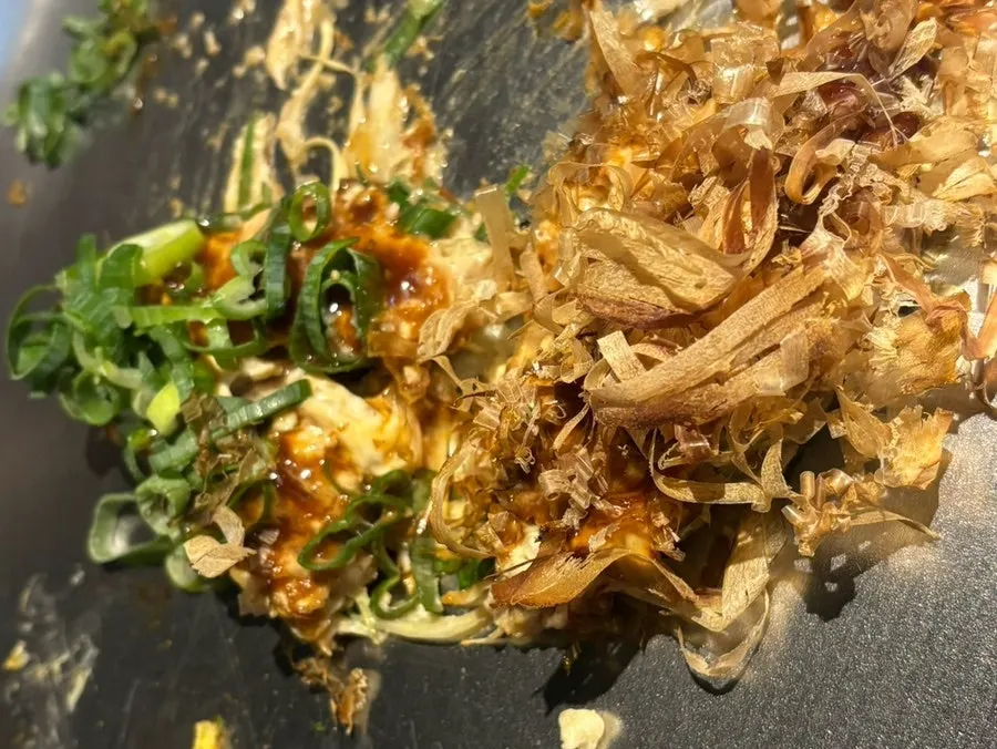 Freshly made hot okonomiyaki on the teppan