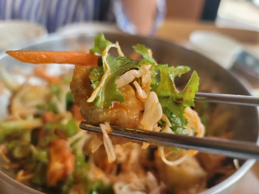 Bibim mandu served in a large bowl