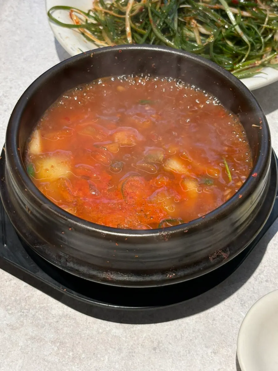 Green onion salad and muchim among Risan's basic side dishes