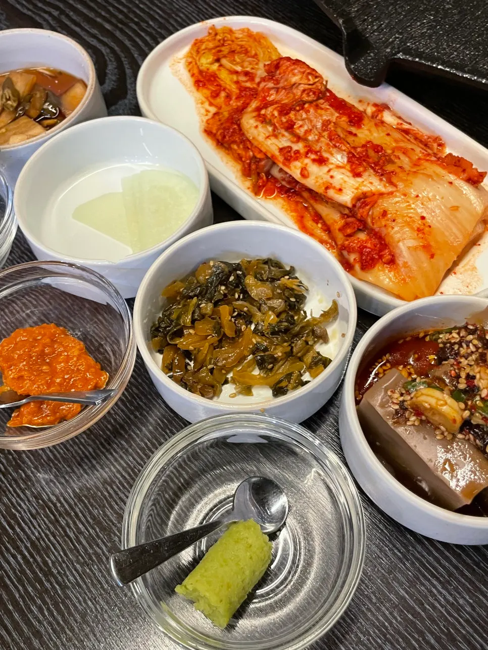 Basic side dishes including wasabi and ssamjang for the meat