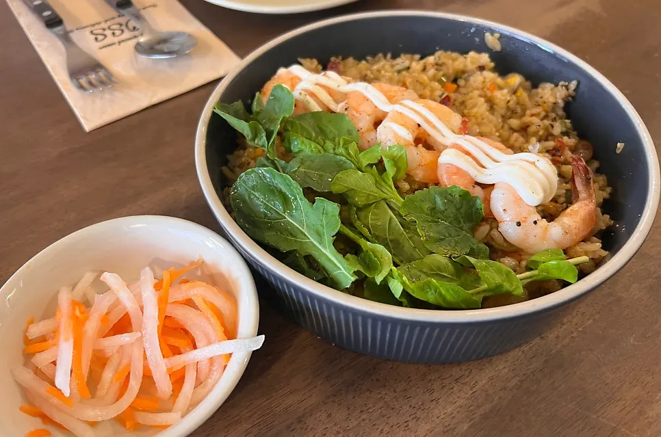 Oseuseu's shrimp pilaf topped with whole shrimp