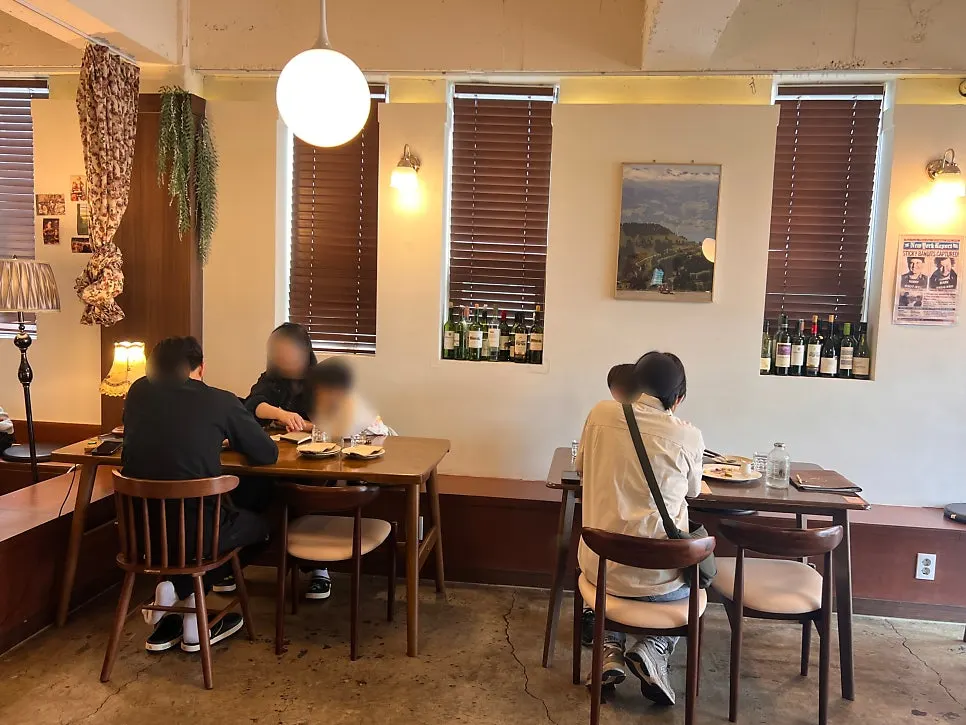 Interior of Oseuseu showing tables and lighting