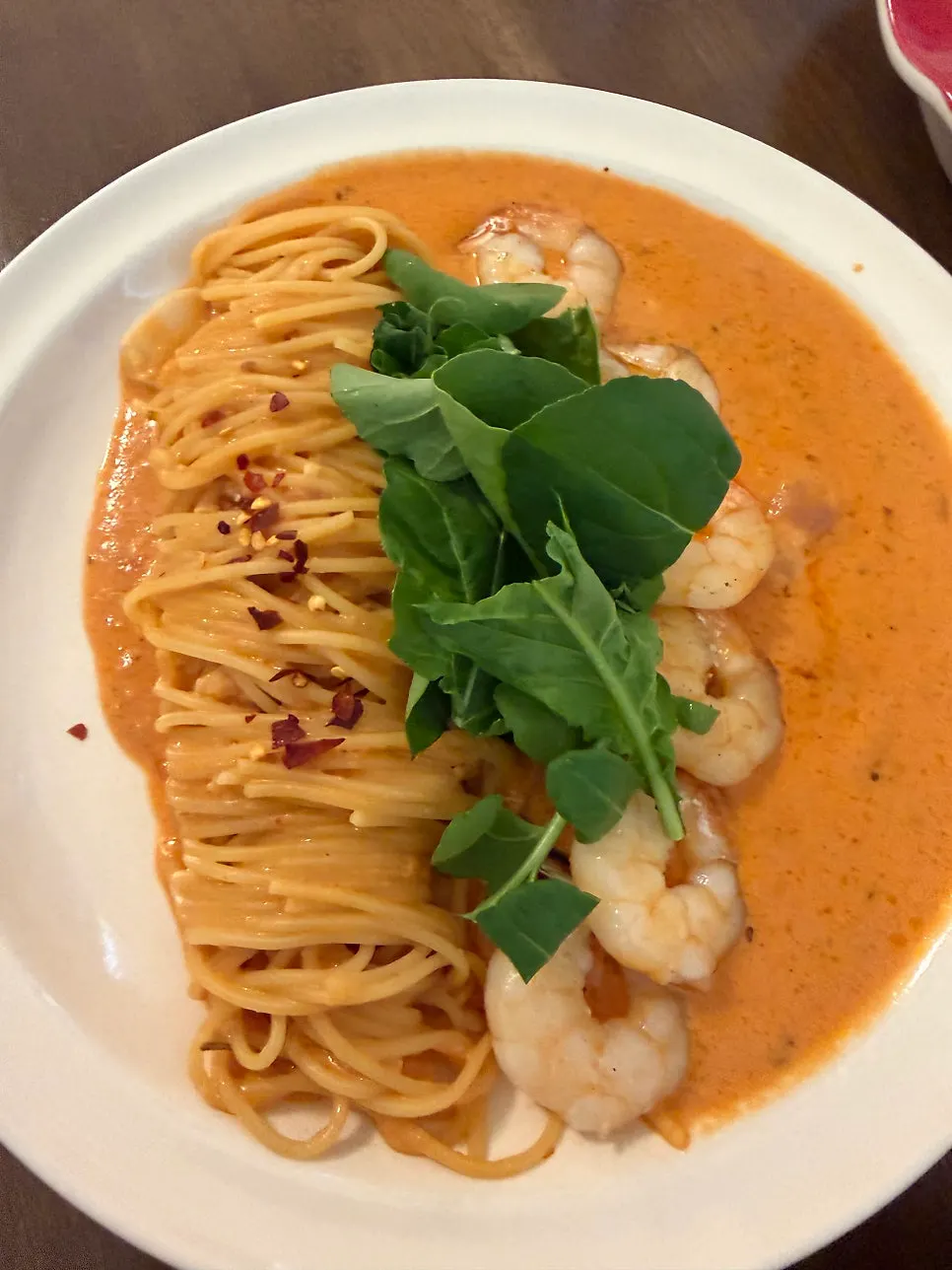Shrimp rosé pasta topped with plump shrimp