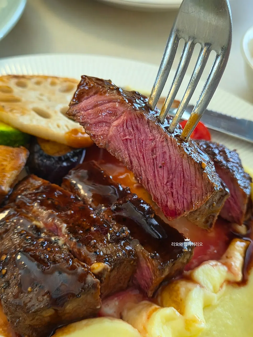 Cross-section of the rare-cooked house steak