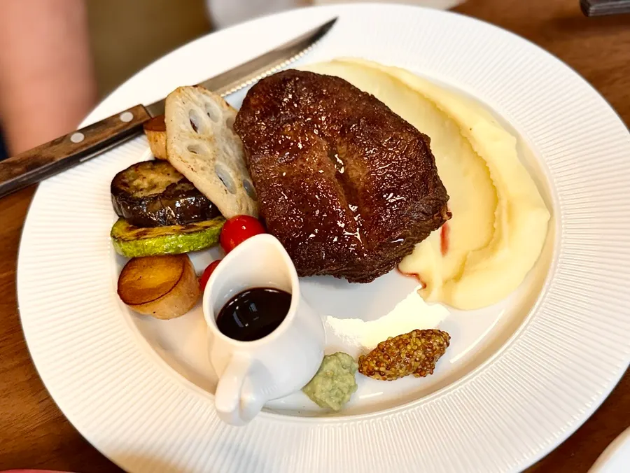 House steak served with mashed potatoes