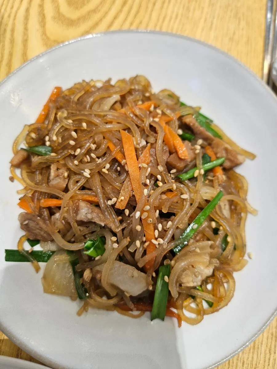 Squid stir-fry served with a bowl of rice