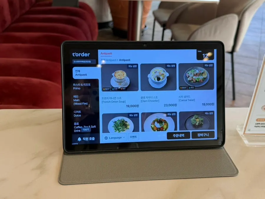 Menu page listing pasta and steak dishes
