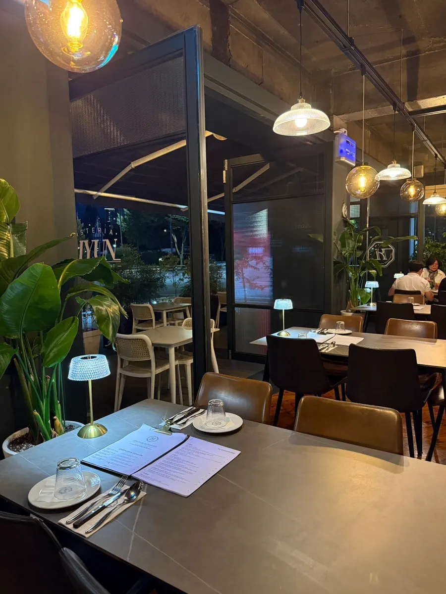 Osteria Hyeon's interior with generously spaced tables