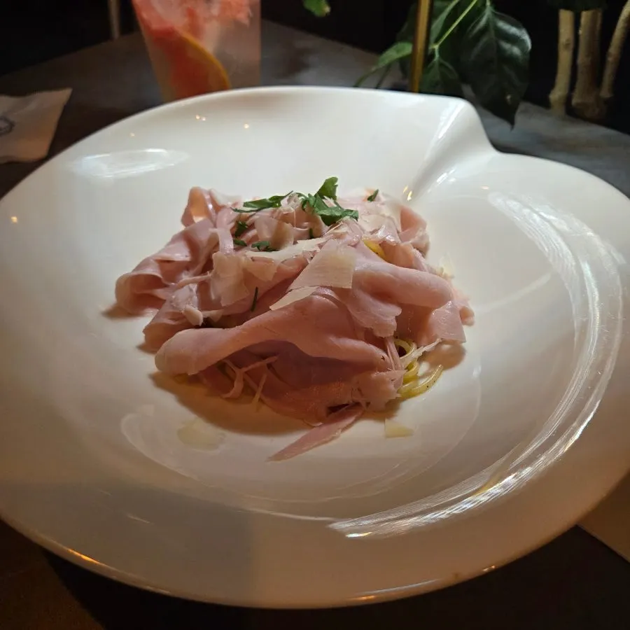 Pasta with black pork prosciutto cotto and butter