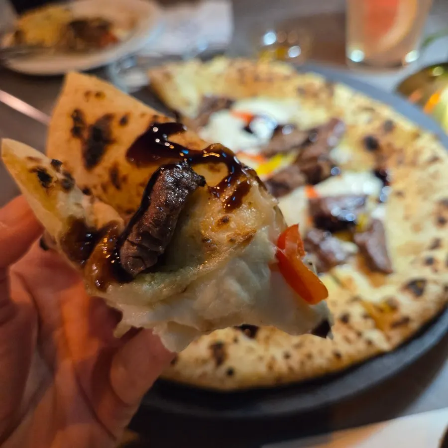 Korean beef wood-fired pizza with accompaniments