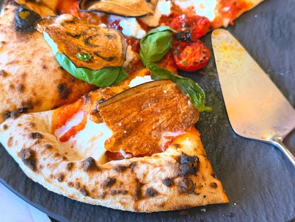 Melanzane pizza slowly enjoyed at Osteria Hyeon