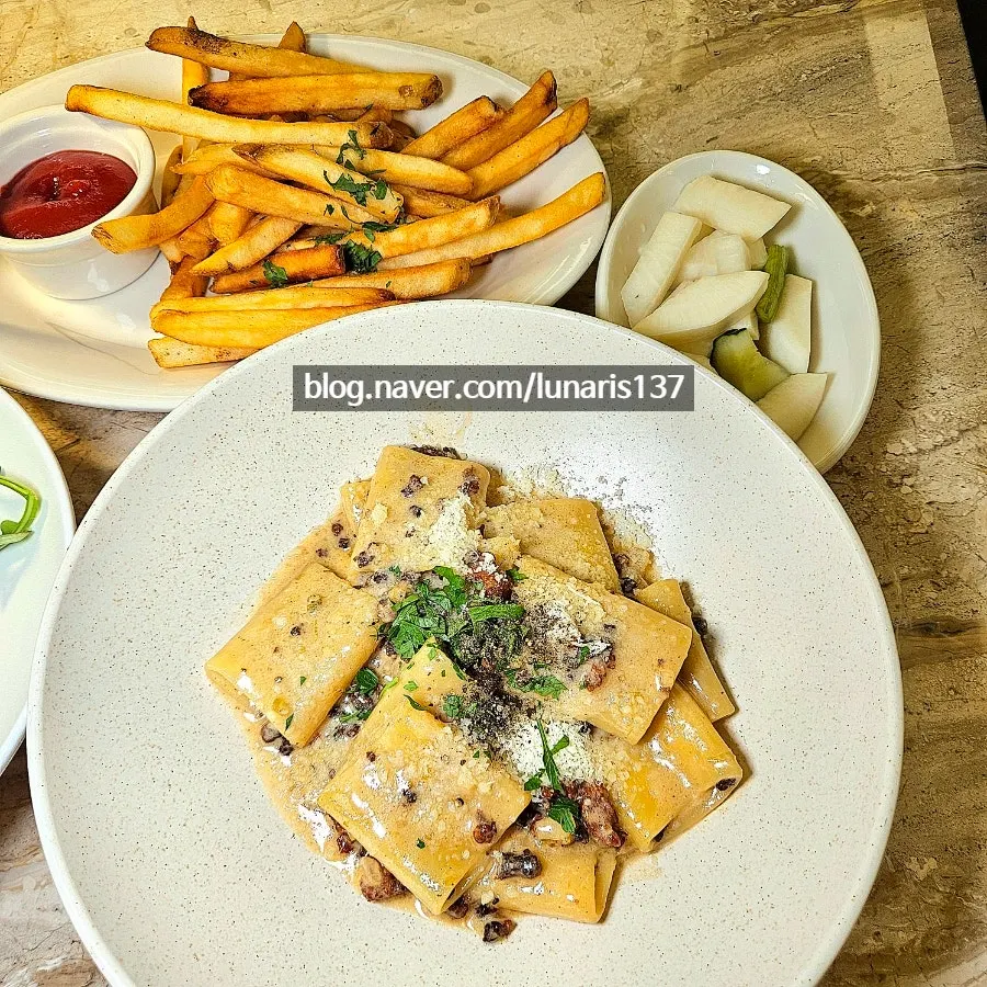 A plate of hanwoo two-plus grade ragu bianco pasta