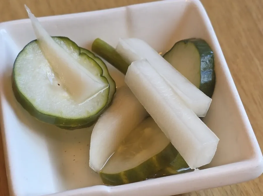 Pickles served alongside the meal