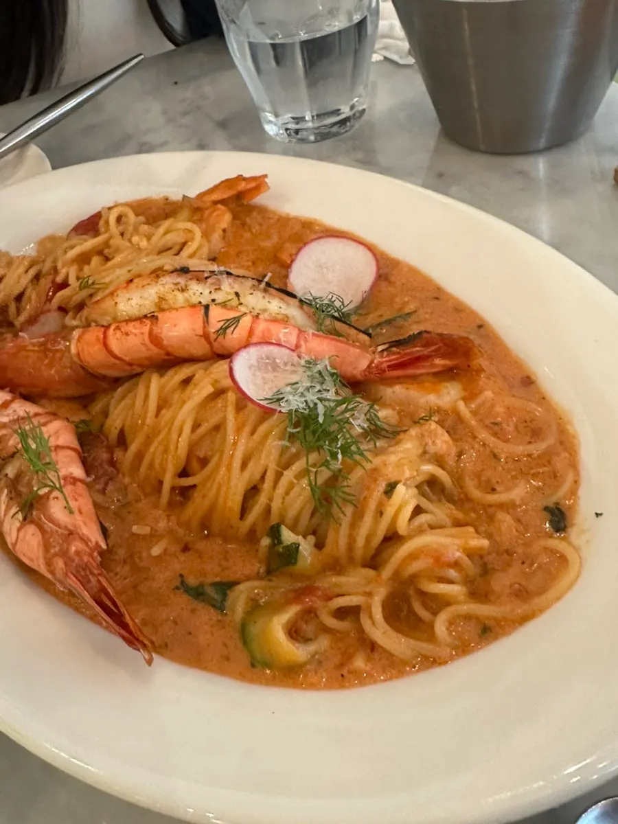 Plump shrimp on top of the pasta