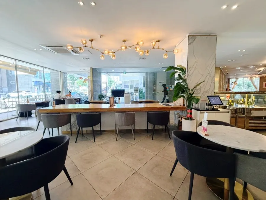 Window seating and interior atmosphere at Osteria Ottivo