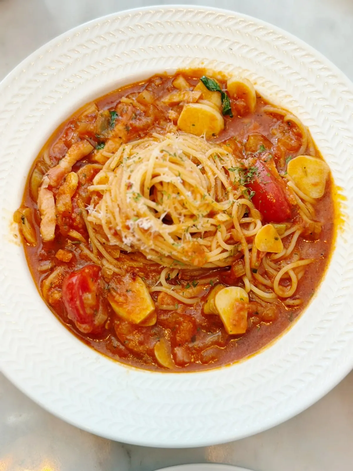 Spicy tomato pasta with cherry tomatoes and bacon