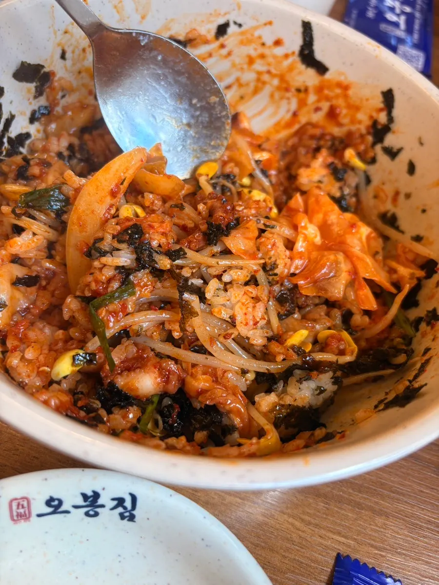 Octopus stir-fry cut into pieces with scissors