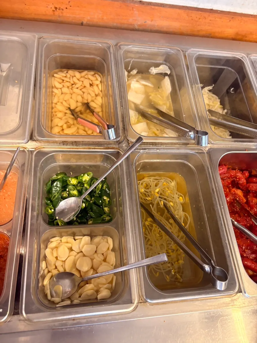 Plate of banchan gathered from the self-serve bar