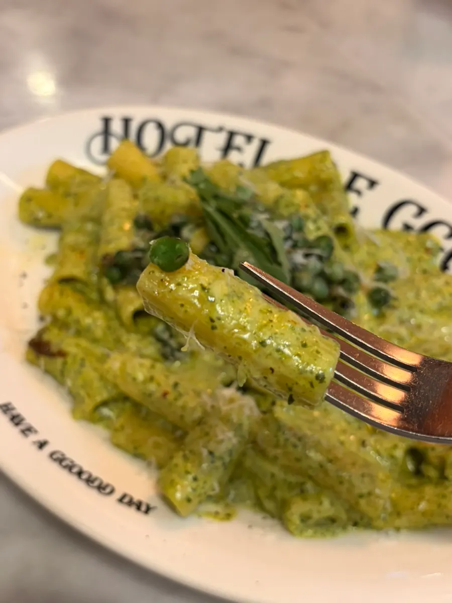 A bite of spicy basil cream sauce pasta
