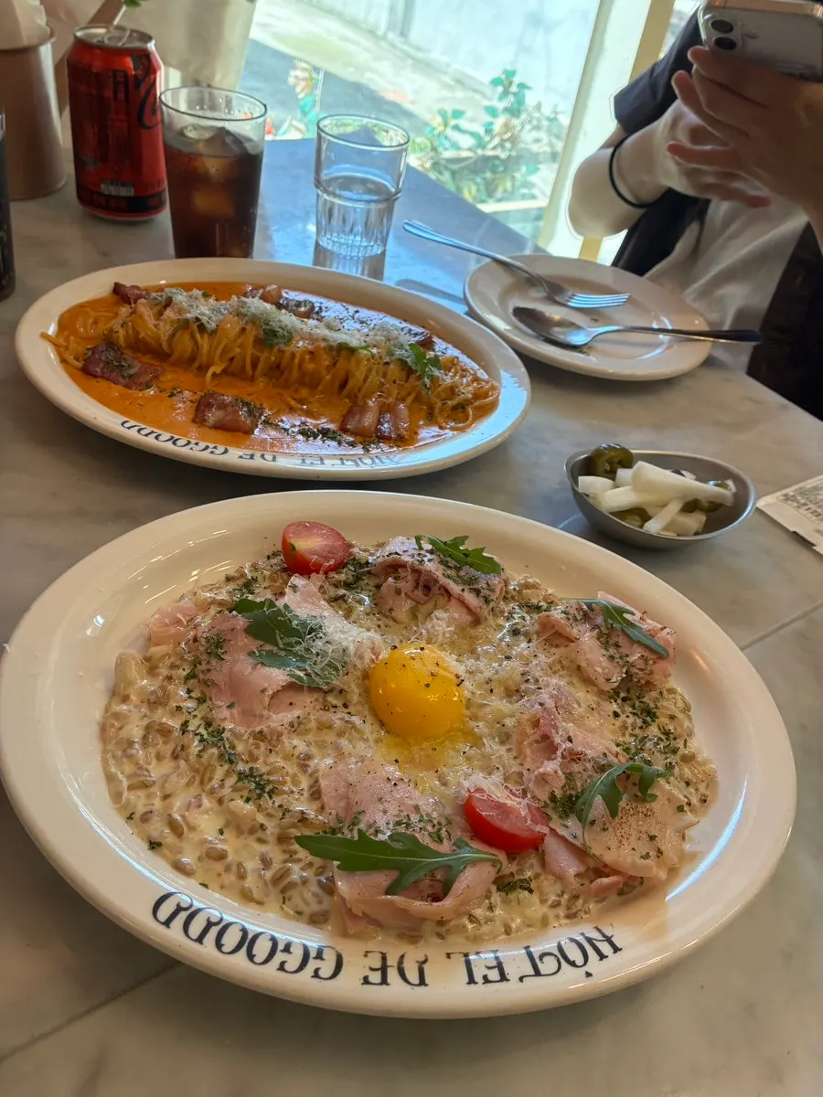 Table at Hôtel de Couture with pasta and risotto side by side
