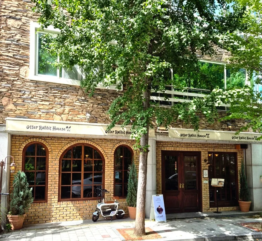 Brick and wood-tone exterior of Otter Rabbit House