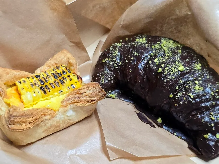 Croissant and egg tart packed to go