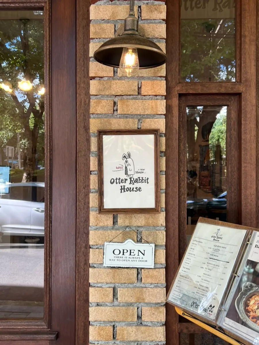 Café entrance finished in wood and brick