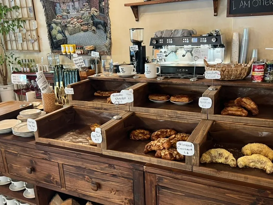 Bread and pastries displayed on shelves