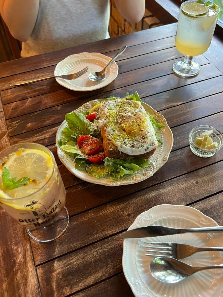 Egg basil French toast served over a bed of vegetables