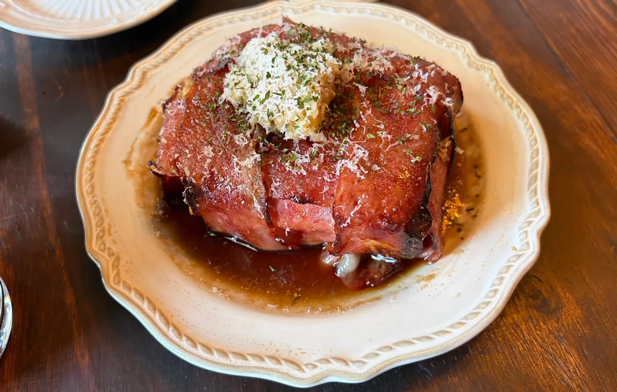 French toast topped with cheese and bacon