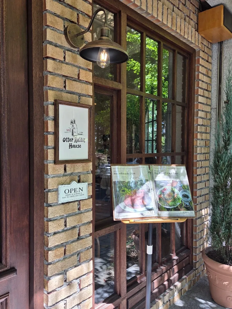 Café entrance with wooden door and exterior