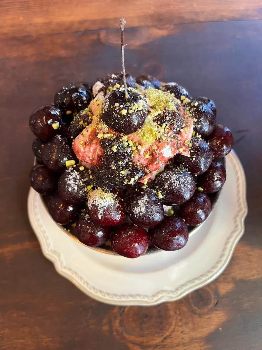 Cherry bingsu piled with whole cherries