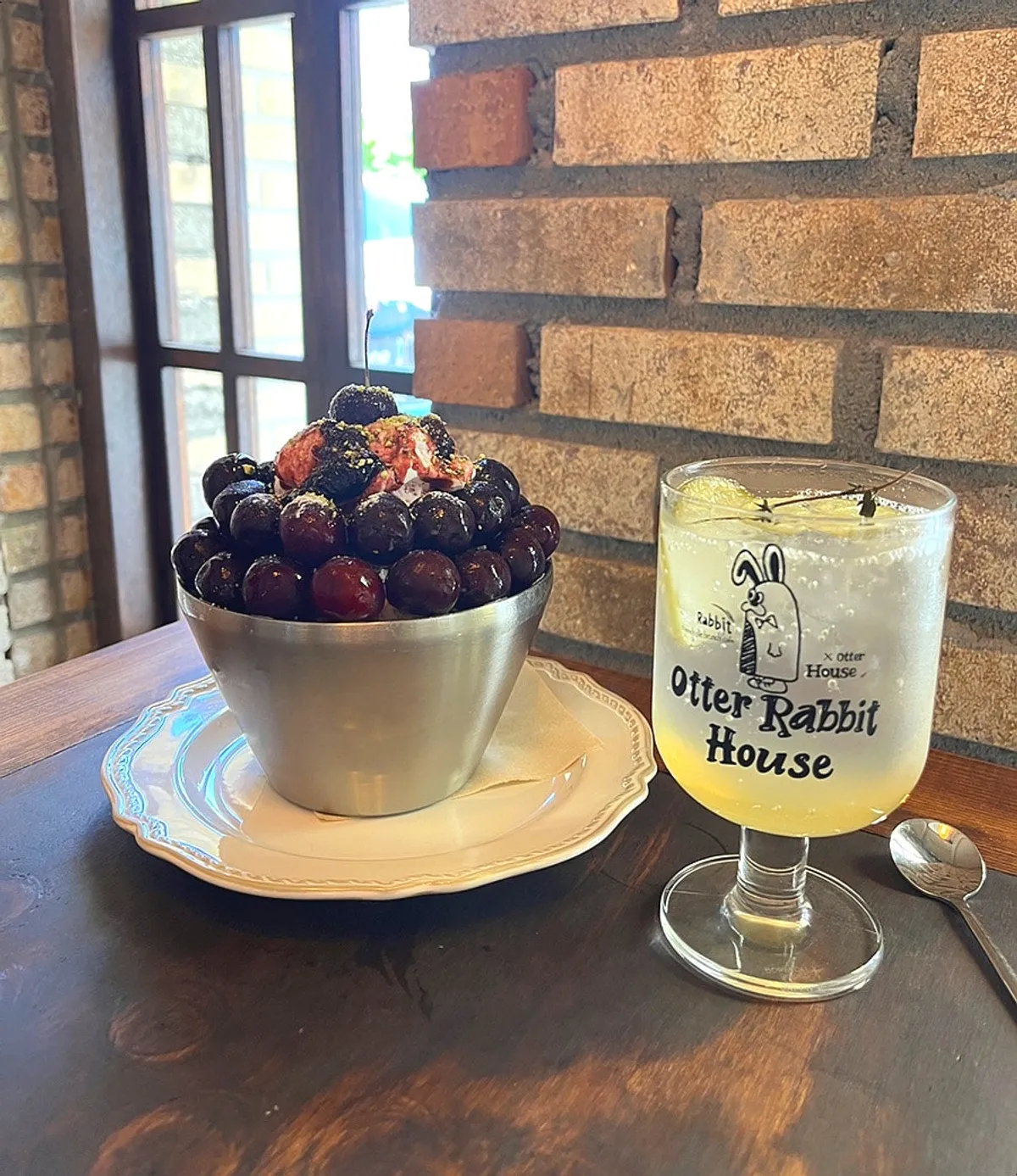 Close-up of cherry bingsu nearly overflowing with cherries