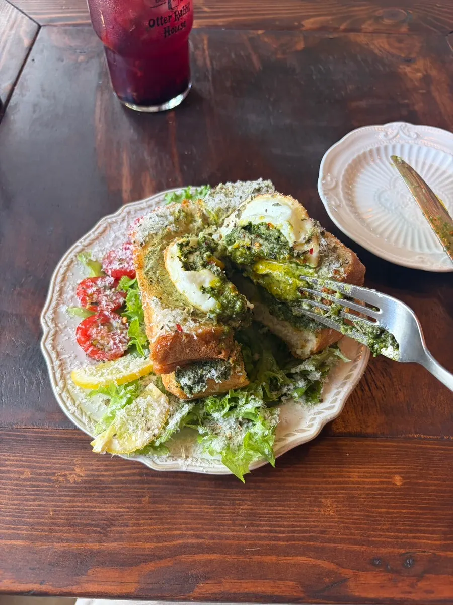 Cross-section of toast layered with basil