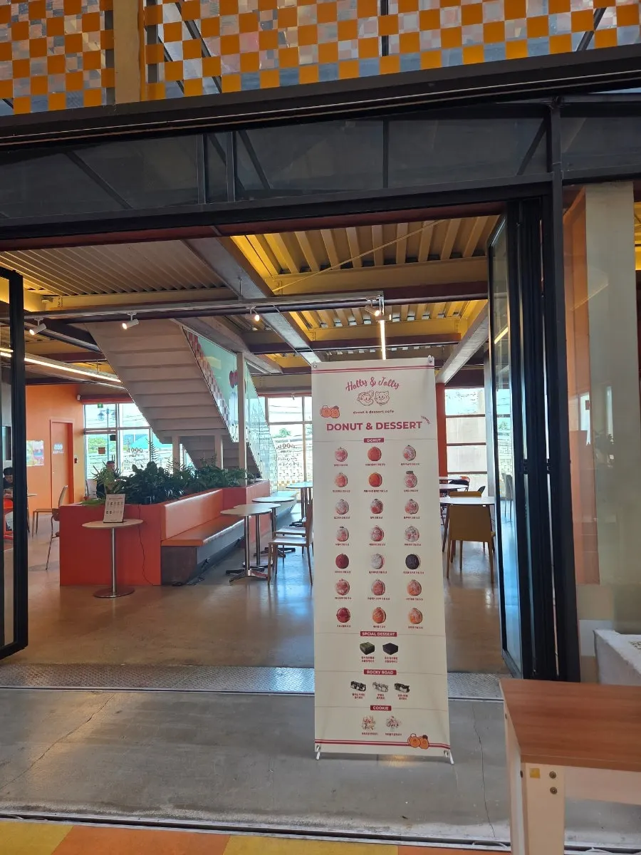Wide walkway and tables inside the café