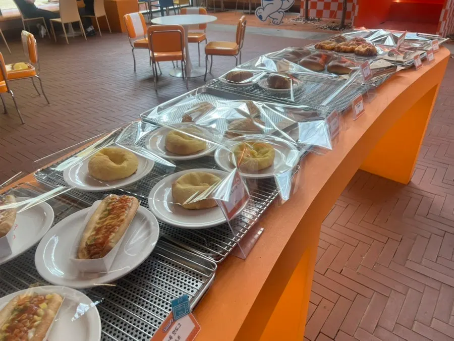 Bakery corner with plastic-wrapped baked goods