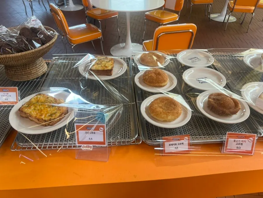 Breads arranged by type on the display shelf