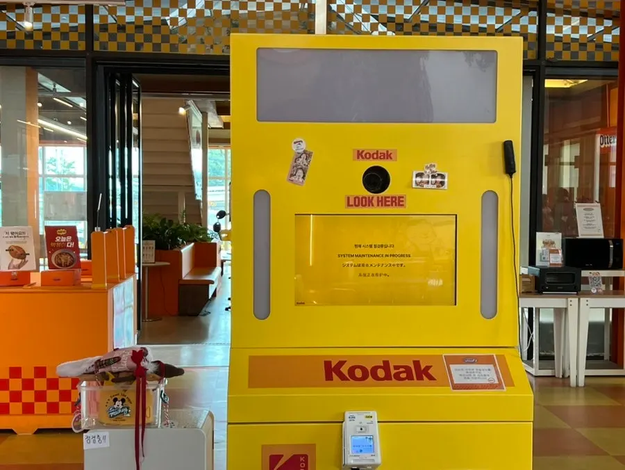 Kodak four-cut photo booth inside the café