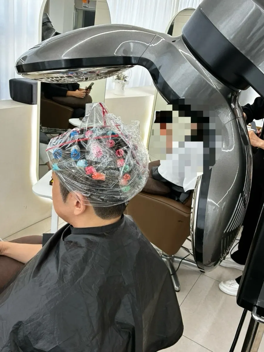 Applying perm solution during the service