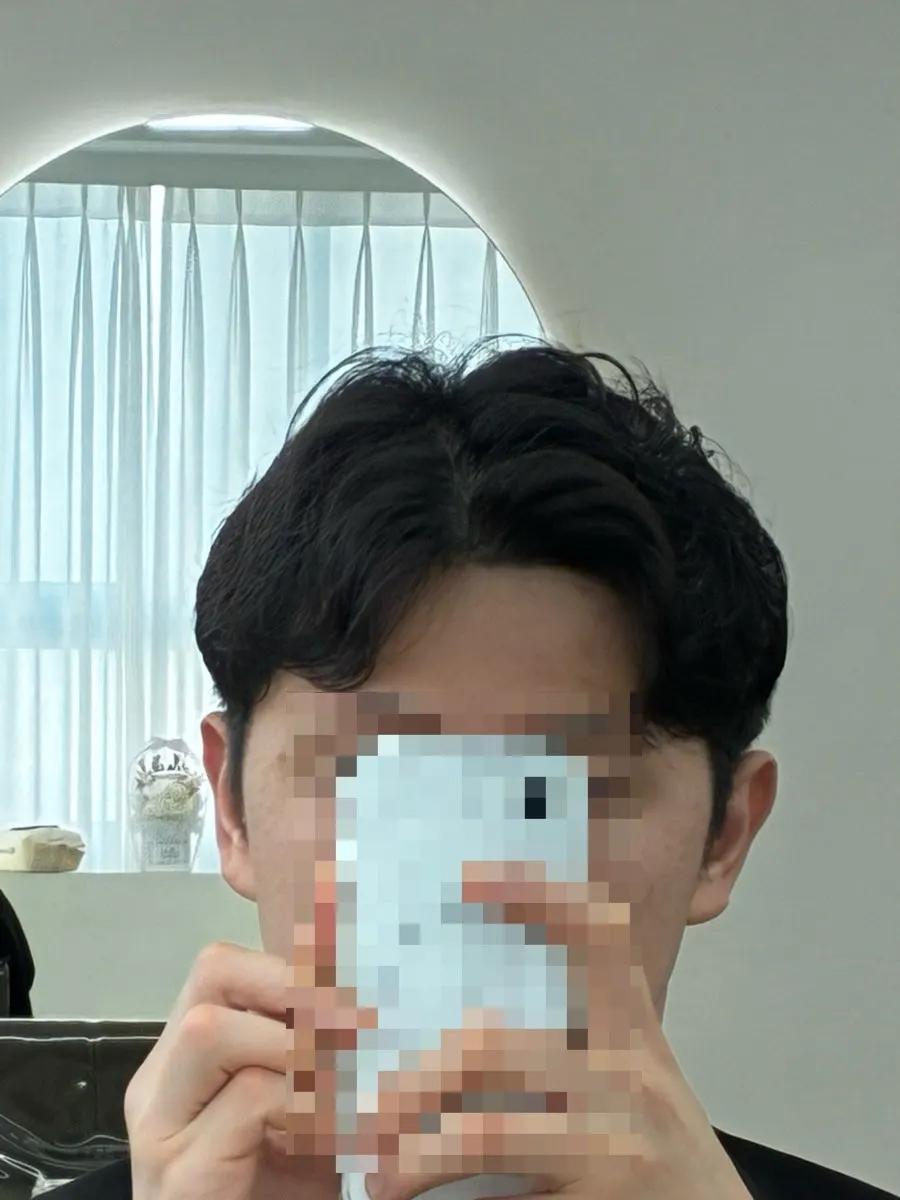 Back silhouette after the side-part perm