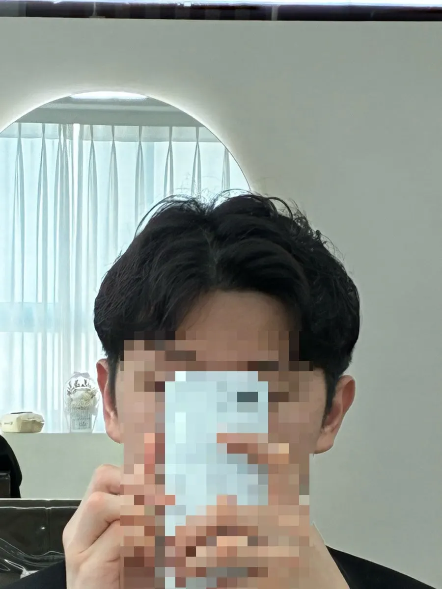 Full look of the finished men's side-part perm at Owlly Yeoksam Branch